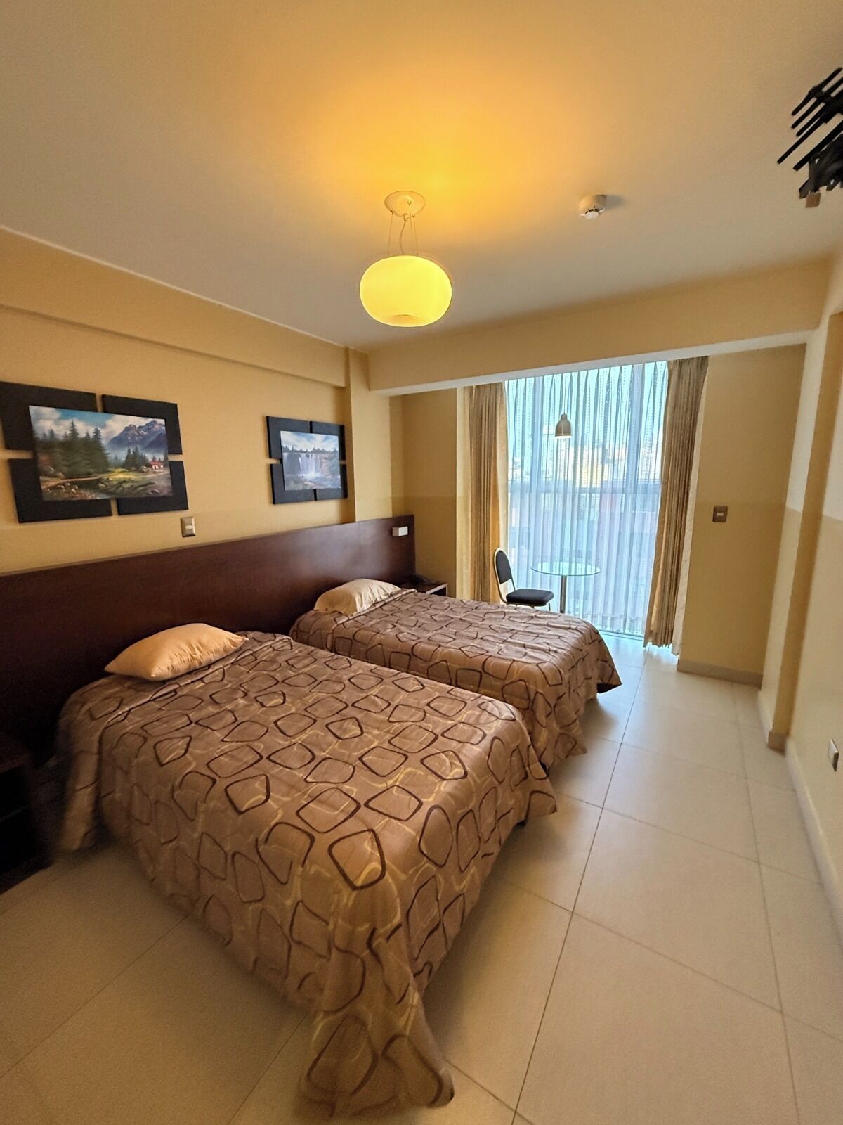 Family Twin Room, Private Bathroom, City View | Laptop workspace, free WiFi