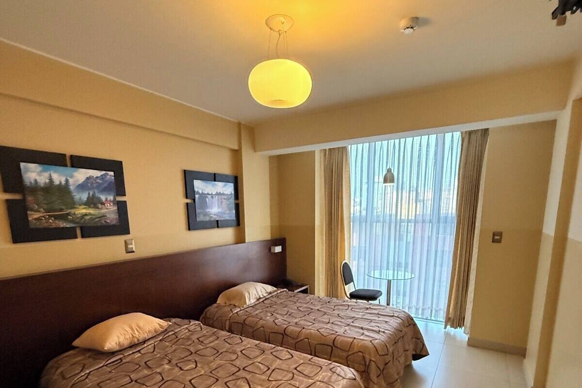 Family Twin Room, Private Bathroom, City View | Laptop workspace, free WiFi