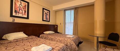 Family Triple Room, Multiple Beds, Private Bathroom, City View | Laptop workspace, free WiFi