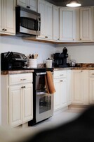 Casa, varias camas, bañera de hidromasaje (The 312 House) | Cocina privada