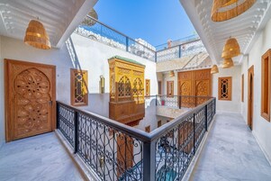 Deluxe Double Room, Patio, Courtyard View | In-room safe, iron/ironing board, free WiFi