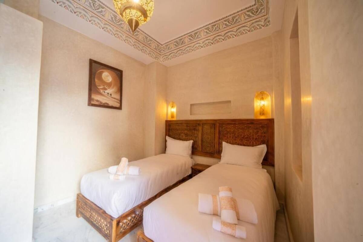 Deluxe Twin Room, Courtyard View | In-room safe, iron/ironing board, free WiFi