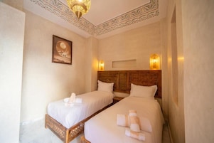 Deluxe Twin Room, Courtyard View | In-room safe, iron/ironing board, free WiFi