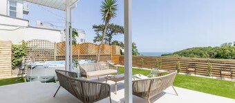 Victorian Villa with sea views and hot tub close to the beach with a games room.