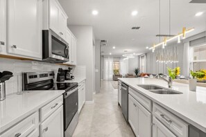 Fridge, oven, dishwasher, coffee/tea maker