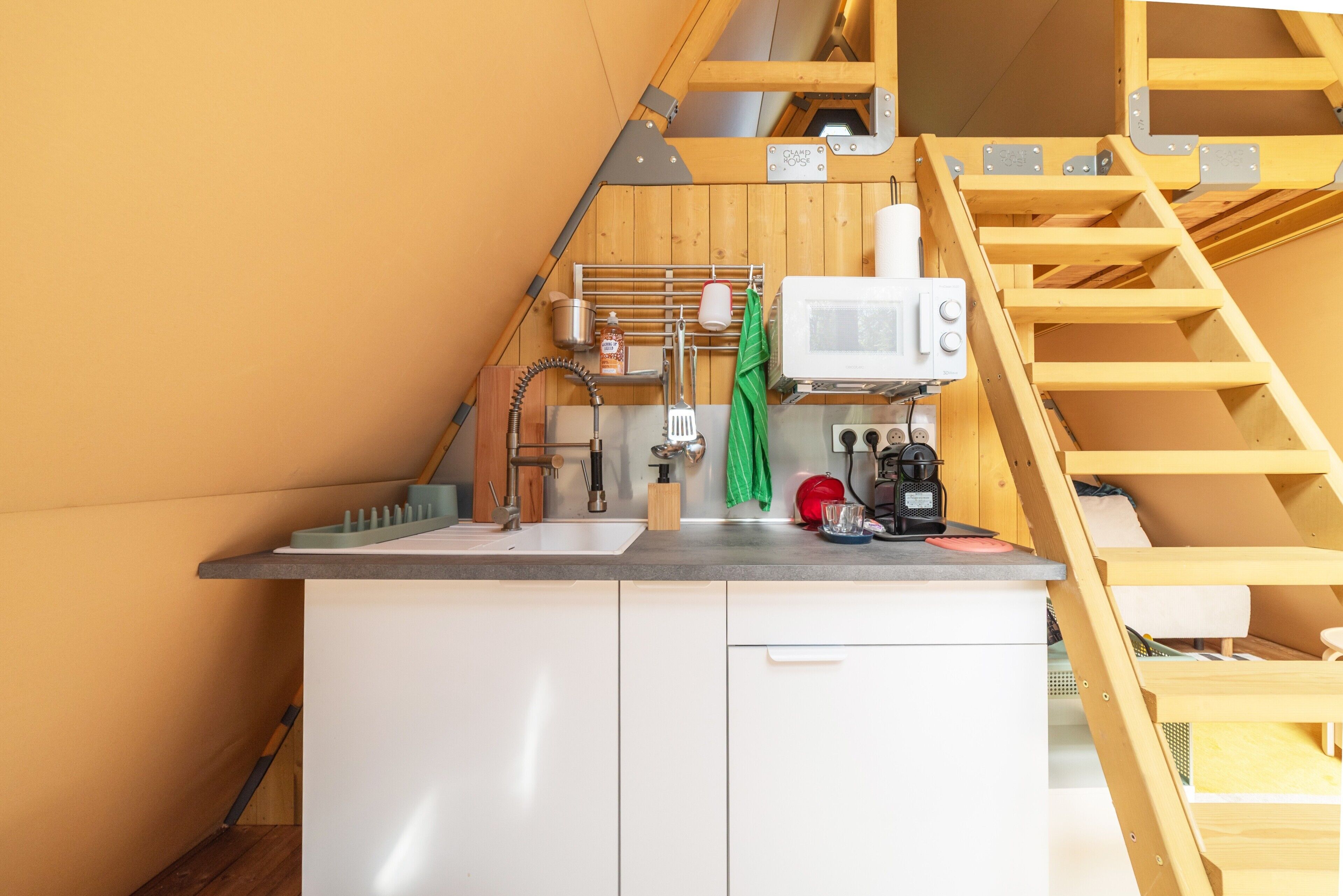 Fridge, microwave, stovetop, coffee/tea maker