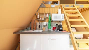 Fridge, microwave, stovetop, coffee/tea maker