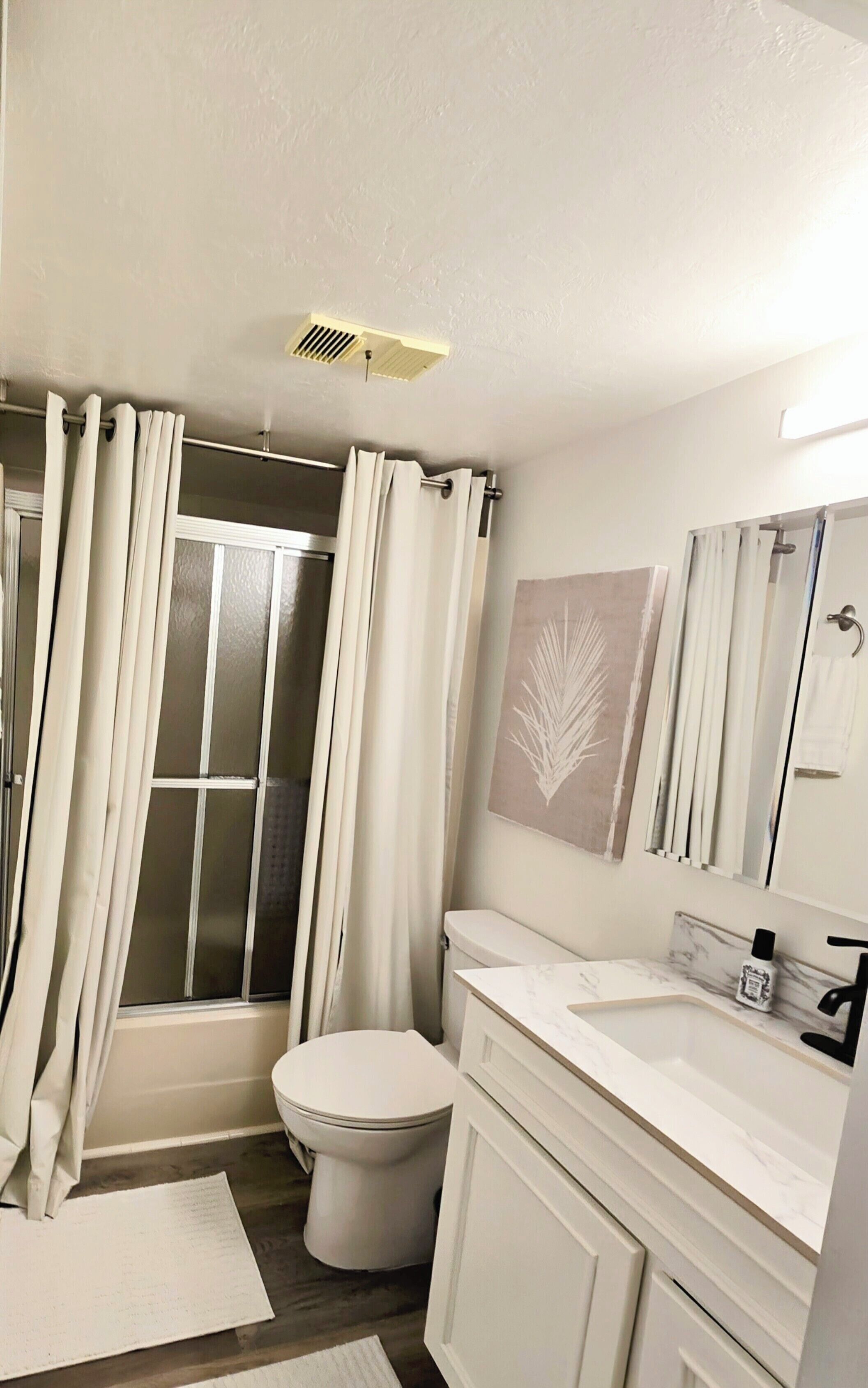 Hair dryer, towels, soap, toilet paper