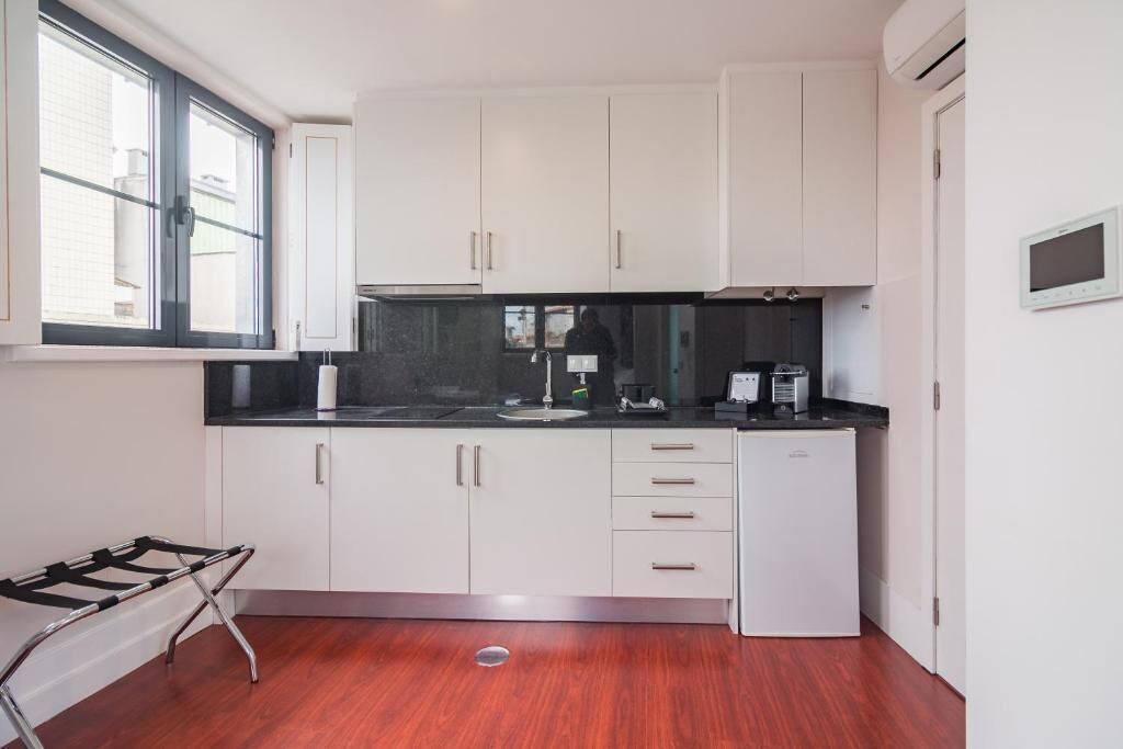 Apartamento superior, vistas a la ciudad | Cocina privada