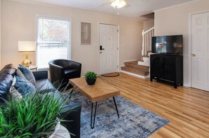 Living area - Comfort-Focused 2BR with Workspace & Fast WiFi (Charlotte)