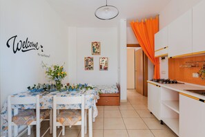 Fridge, microwave, cookware/dishes/utensils