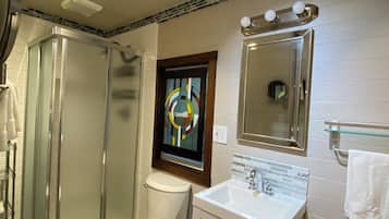 Shower, towels, toilet paper