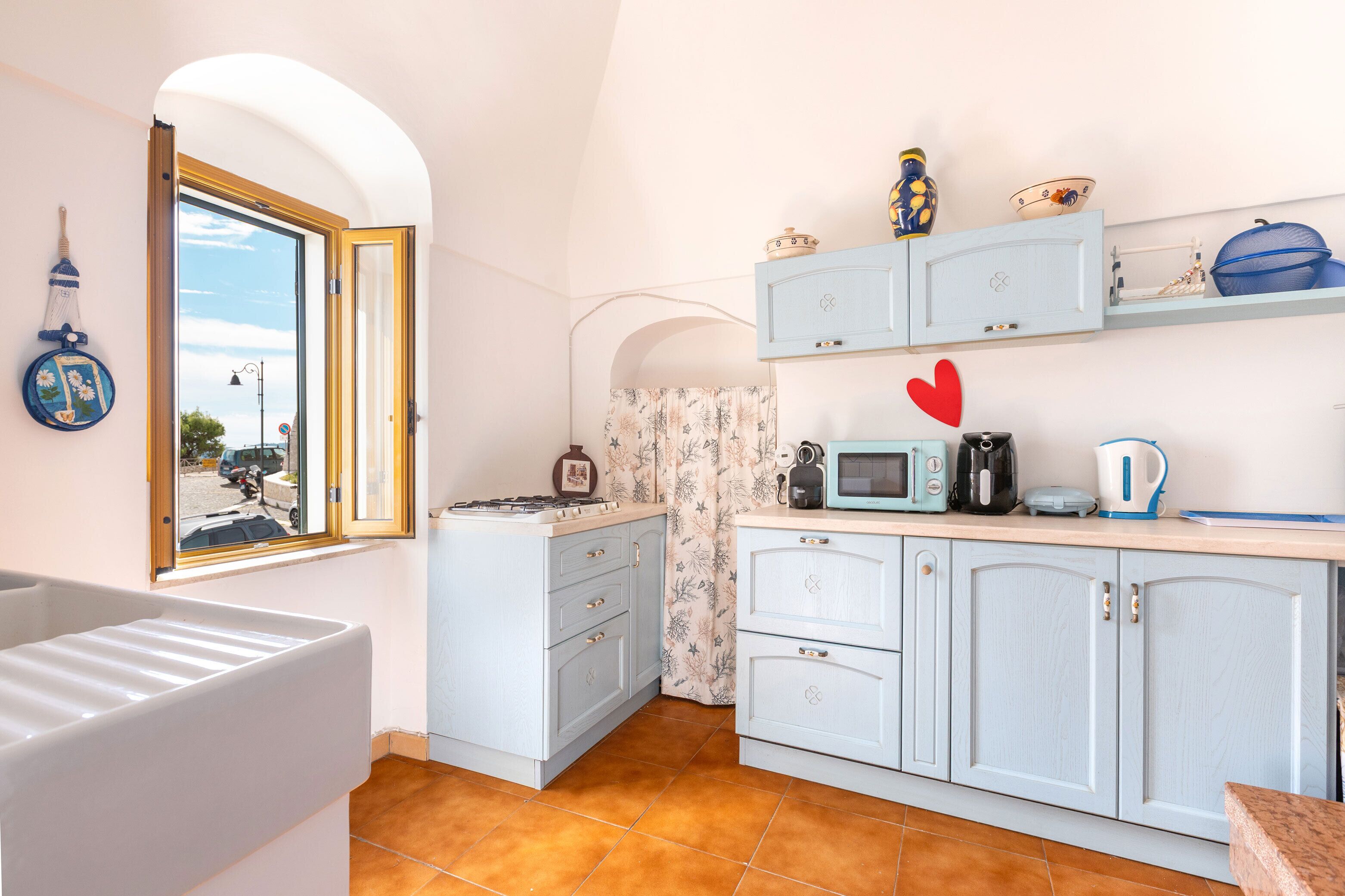 Fridge, microwave, cookware/dishes/utensils