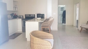 Private kitchen - This gated community offer a Tranquil 1-bedroom condo with pool & 5 min to beach (Christ Church)