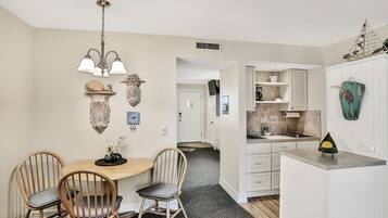 Condo, 1 Queen Bed, Patio, Pool View (Tucked Away in the Sand) | Private kitchen | Fridge, microwave, stovetop, cookware/dishes/utensils