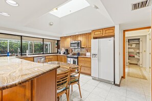 House, Multiple Beds, Pool Access, Garden View (St Christopher's Retreat) | Private kitchen | Dining tables - St Christopher's Retreat (Vero Beach)