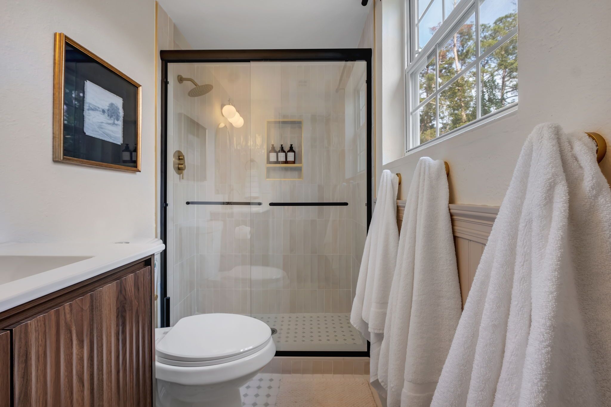 Shower, hair dryer, towels, soap