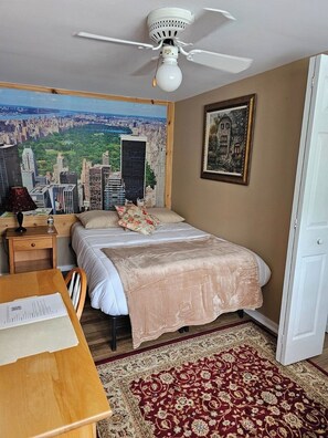 1 غرفة نوم ومكواة/لوح كي وواي فاي وملاءات أسرّة