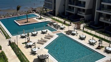 2 outdoor pools, pool umbrellas, sun loungers