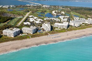 Studio, 1 King Bed, Non Smoking, Balcony | Beach | On the beach, sun loungers, beach umbrellas, beach towels - Beach Villas (Stuart)