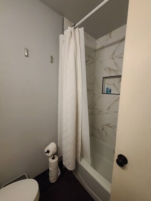Hair dryer, towels, soap, shampoo