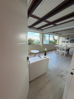 Family Quadruple Room, Mountain View | Living area