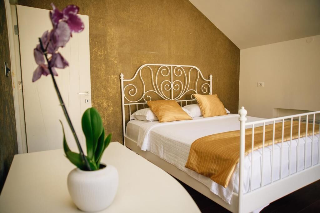 Romantic Double Room, 1 Queen Bed, Balcony | Iron/ironing board, free WiFi, bed sheets