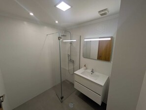 Bidet, towels, toilet paper