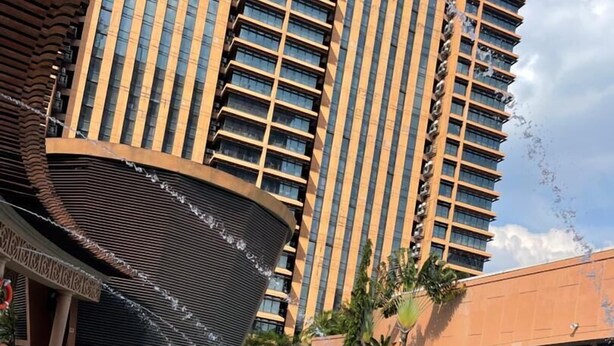 A swimming pool with a modern building in the background. - The Hotel Apartment At Times Square (Kuala Lumpur)