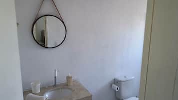 Shower, towels, soap, toilet paper