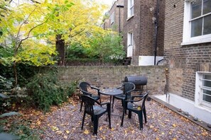 Outdoor dining - Garden 2 Bedroom Flat in Notting Hill (Greater London)