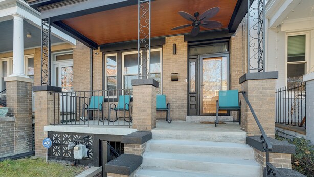 A covered porch with steps leading to a door, outdoor seating, and a ceiling fan. - Remote-Work Hub! DC Unit 1 Mi to Rock Creek Park (Washington)