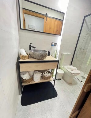 Hair dryer, towels, soap, toilet paper