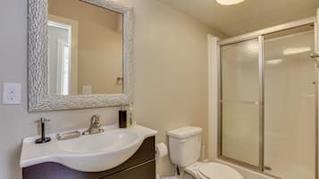 Shower, towels, soap, toilet paper