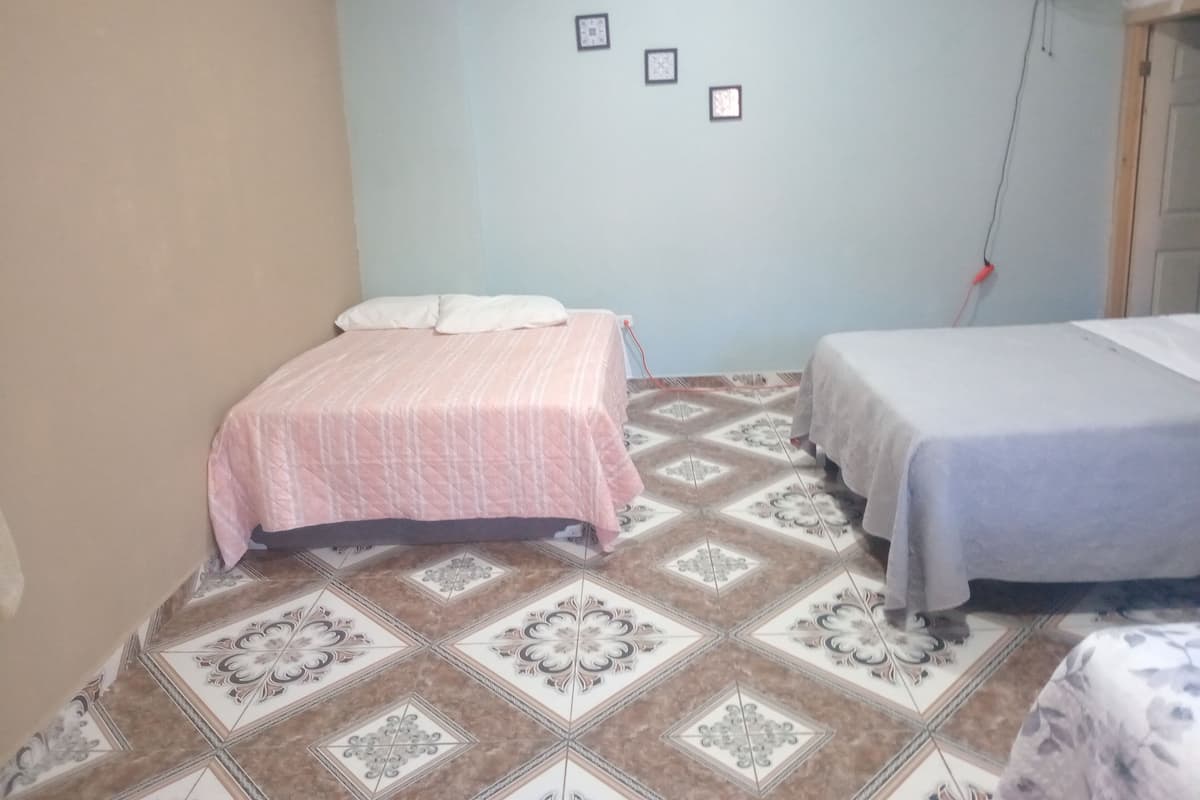 Basic Triple Room, Garden View | Iron/ironing board, free WiFi