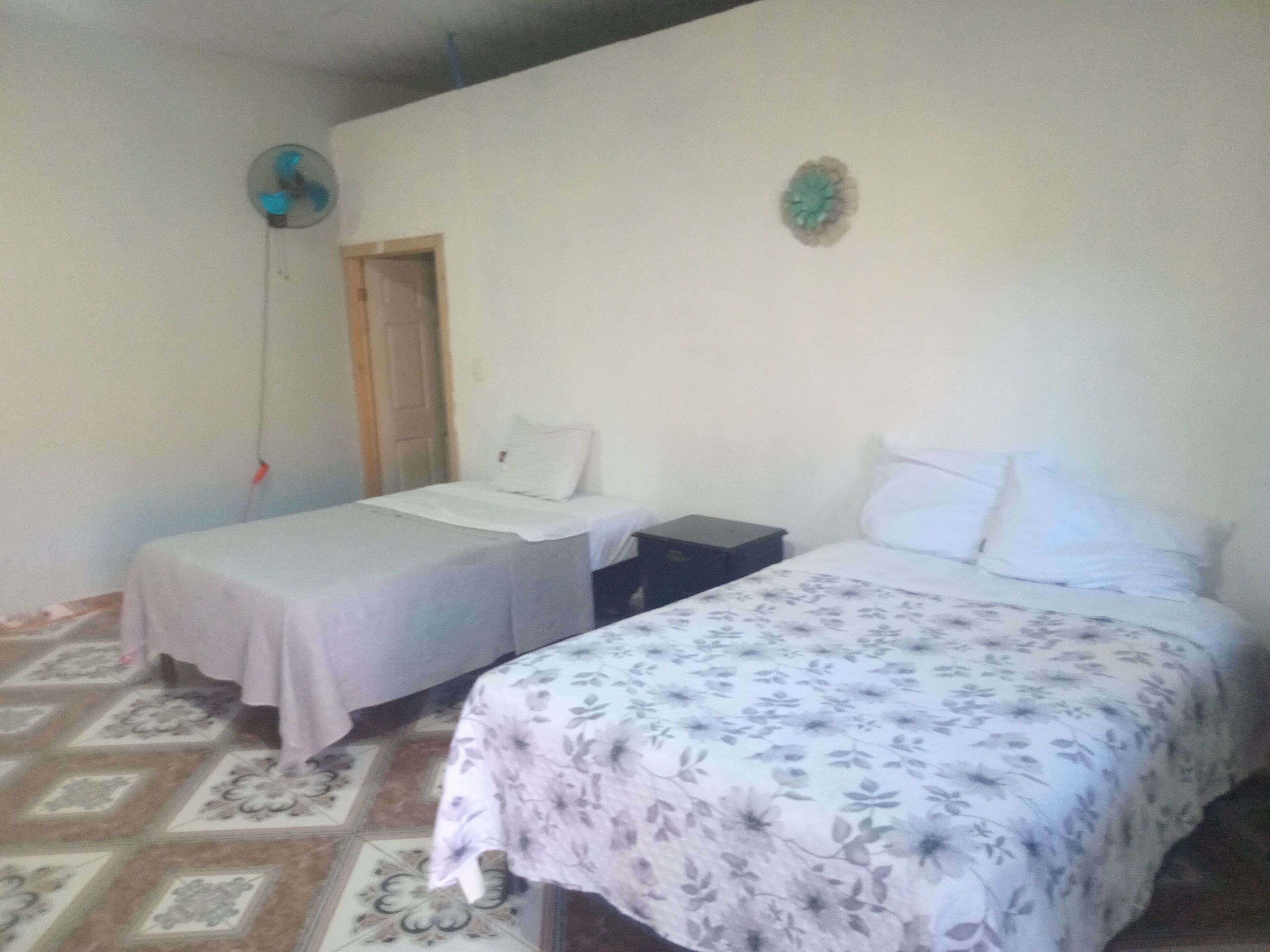 Basic Triple Room, Garden View | Iron/ironing board, free WiFi