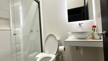 Hair dryer, towels, soap, toilet paper