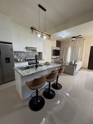 Fridge, stovetop, coffee/tea maker, toaster