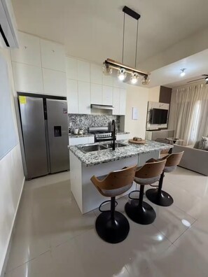 Fridge, stovetop, coffee/tea maker, toaster