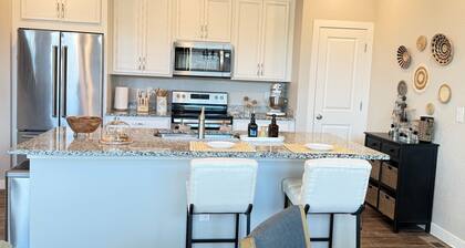 Executive furnished 4BR/4BA townhouse for 30+ day stays with 2-car garage