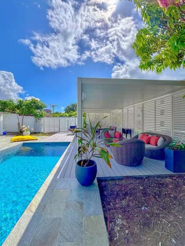 Modern villa with pool in a residential area