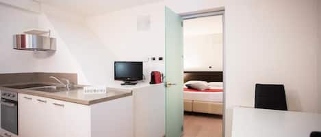 Leilighet, byutsikt | Strykejern/-brett og wi-fi (inkludert)