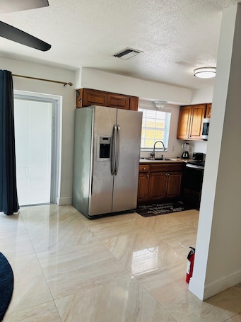 Private kitchen. Discovery Cove with four bedrooms and two bathrooms