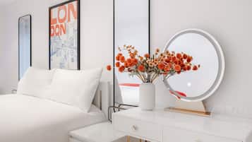 2 habitaciones, caja de seguridad en la habitación y escritorio