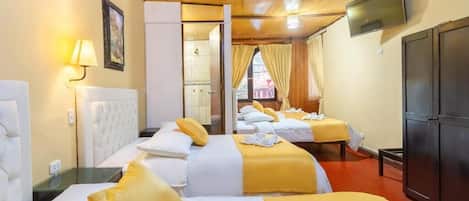 Family Triple Room, City View | Desk, laptop workspace, free WiFi