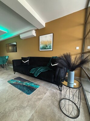 Appartamento Luxury, vista piscina | Area soggiorno