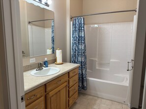 Shower, jetted bath, hair dryer, towels