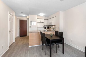 Dining - Stylish 2BR Retreat Steps to SQ1 | Prime Location (Mississauga)