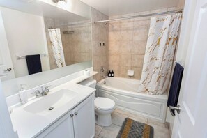 Bathroom - Stylish 2BR Retreat Steps to SQ1 | Prime Location (Mississauga)
