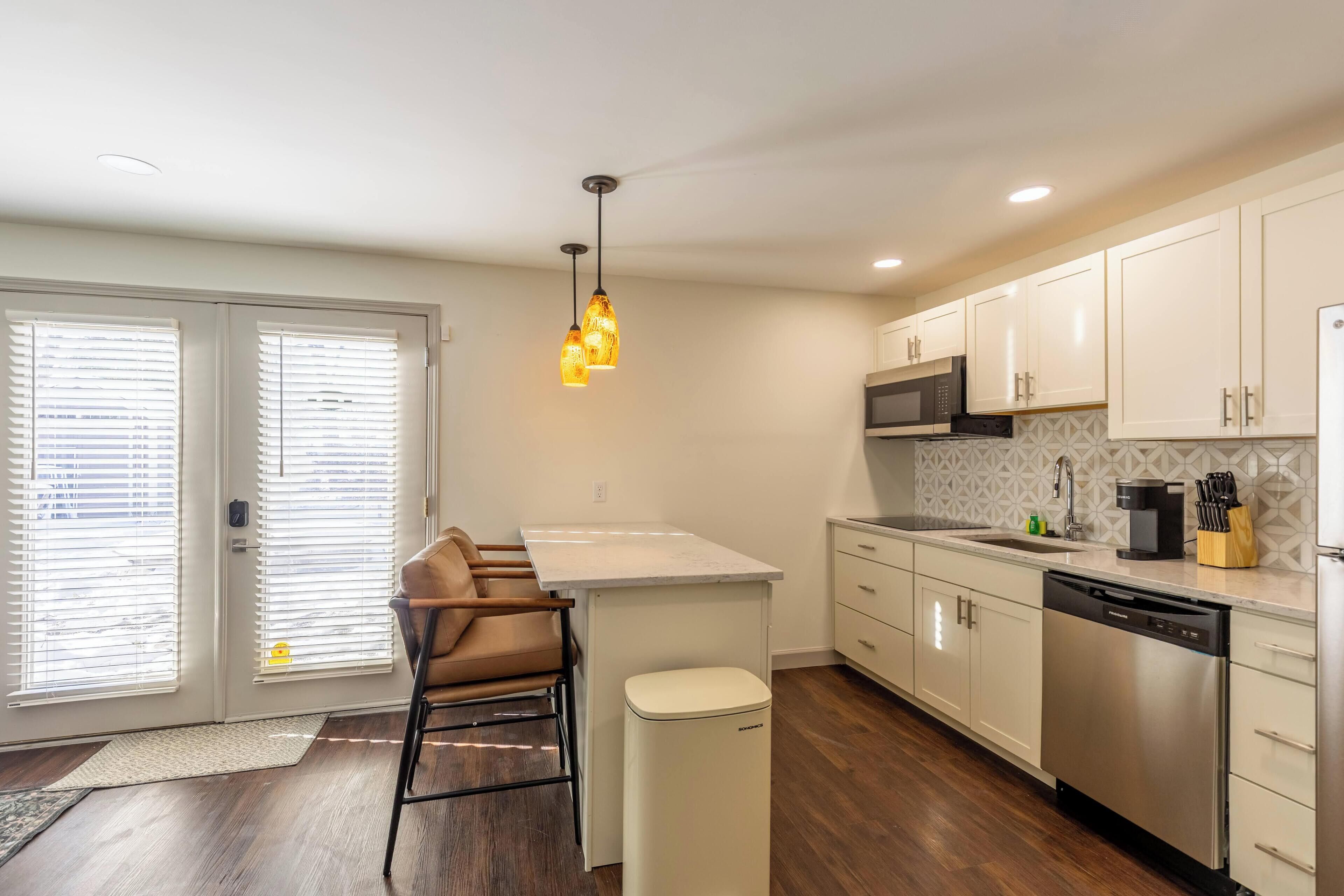 Fridge, microwave, stovetop, coffee/tea maker